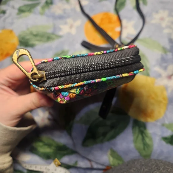 Vibrant Floral Clutch with Black Accents Sakroots - Picture 6 of 12